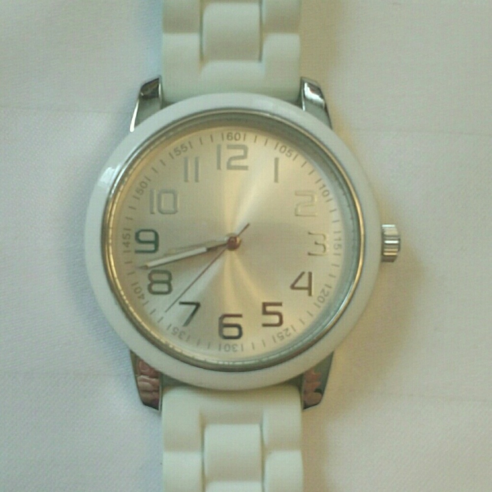 Large face white wristwatch with rubbery band